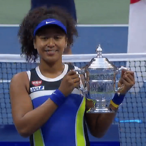 This image has an empty alt attribute; its file name is NAOMI-OSAKA.-GIF.-2020-US-Open.-Trophy-Award-Ceremony.-2.-their-ref-ezgif.com-video-to-gif.gif